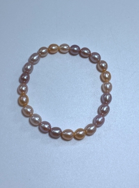 6-7mm天然粉紫色米形淡水珍珠弹力绳手链无核松紧款手串女款