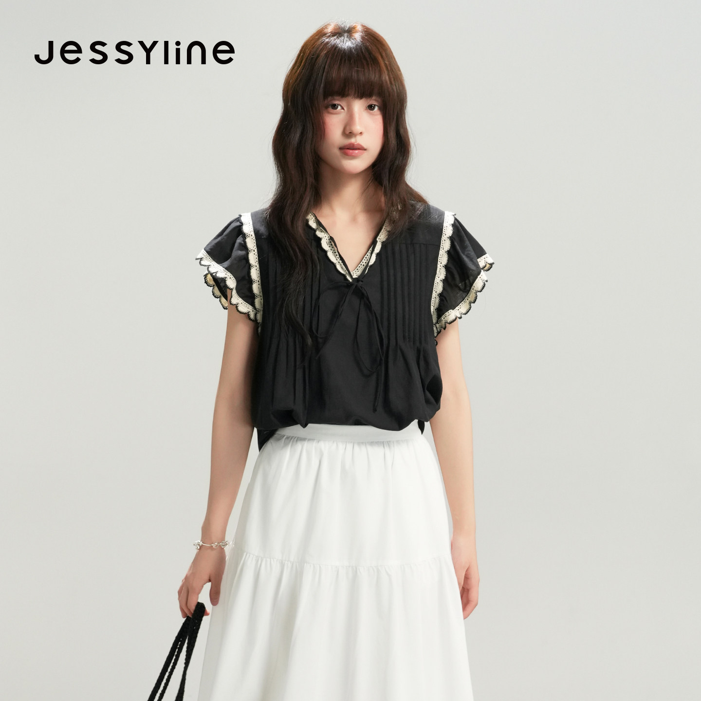 jessyline杰茜莱2026夏新款黑色花边设计感小众系带短袖女士衬衫