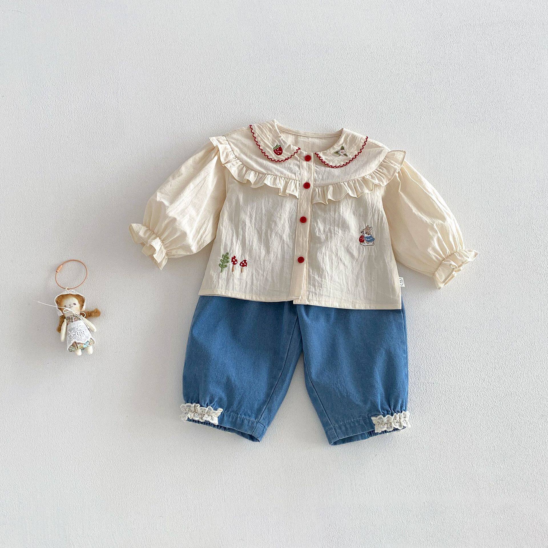 女童卡通刺绣衬衫2026春装新款娃娃领上衣儿童纯棉长袖花边衬衣潮