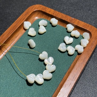 2颗 10mm屁桃爱心白碟贝天然海贝DIY项链手链配珠油润猫眼效应