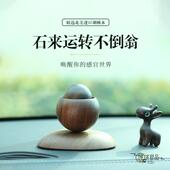 车载精油扩香木不倒翁香氛摆件汽车用持久散香器家用衣柜无火香薰