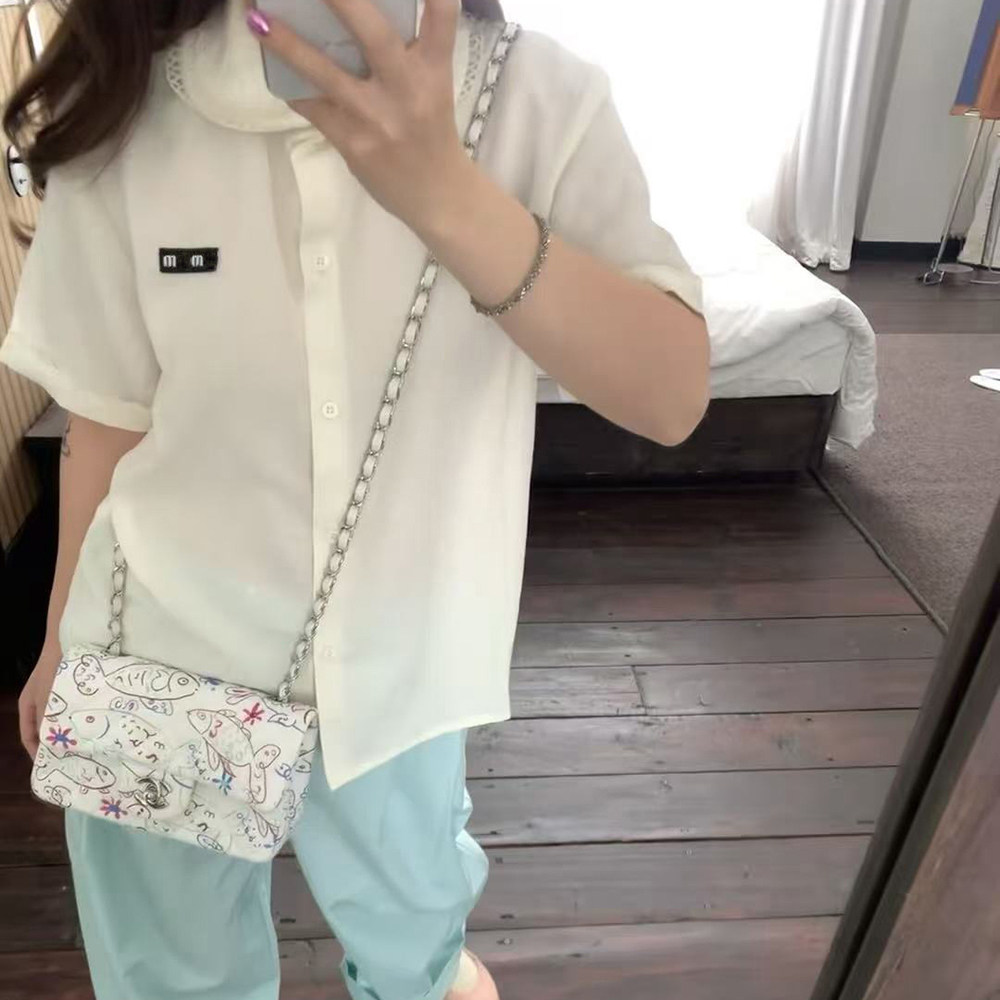 欧货2026春季新款miu系娃娃领衬衫短袖女修身藏蓝色上衣
