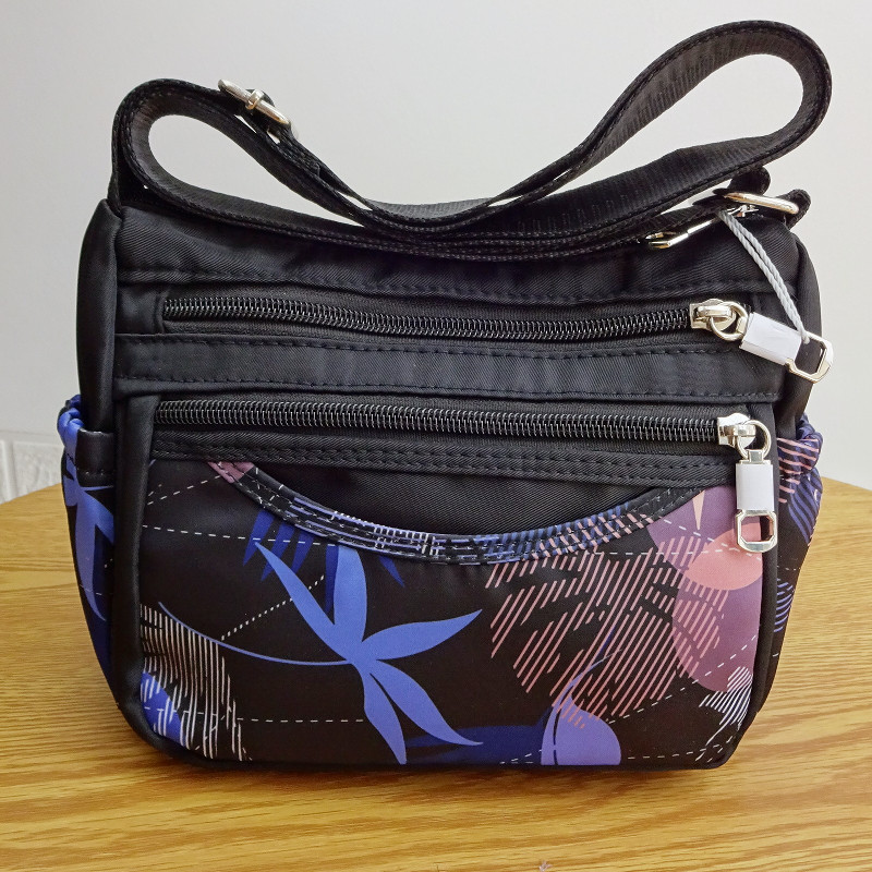 2025新款中老年妈妈帆布大容量斜挎包简约休闲单肩旅游小花布包包