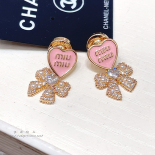 个性 轻奢甜美粉色字母钻蝴蝶结耳环时尚 土星圆球耳钉耳饰925银针