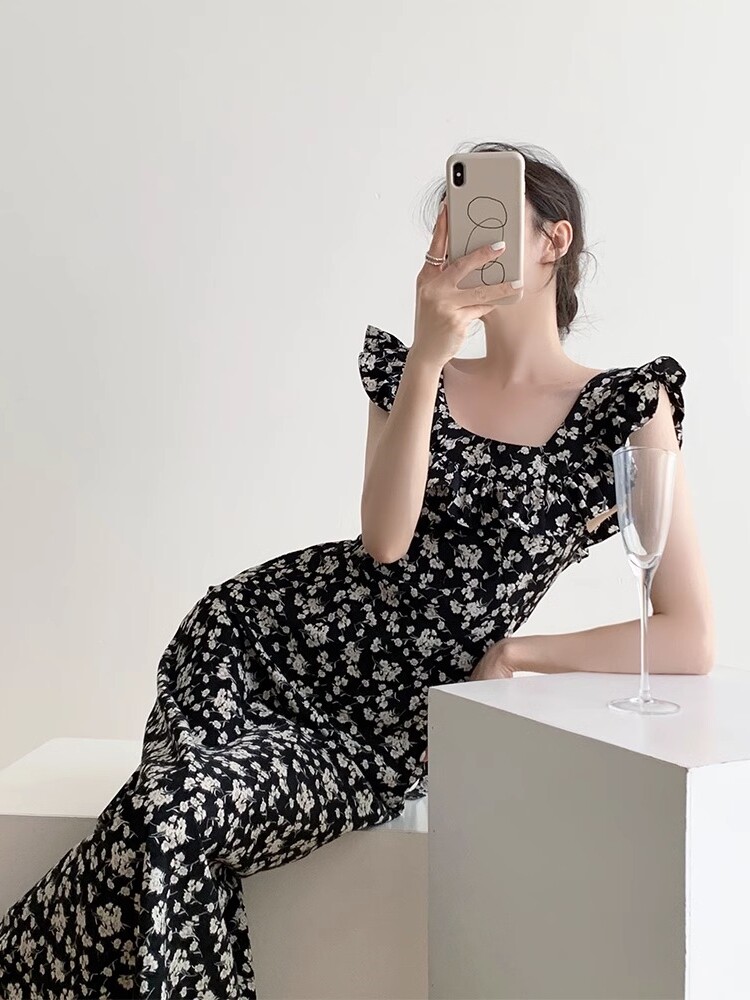 黑色玫瑰岛碎花连衣裙女春夏性感修身中长款收腰显瘦荷叶边裙子