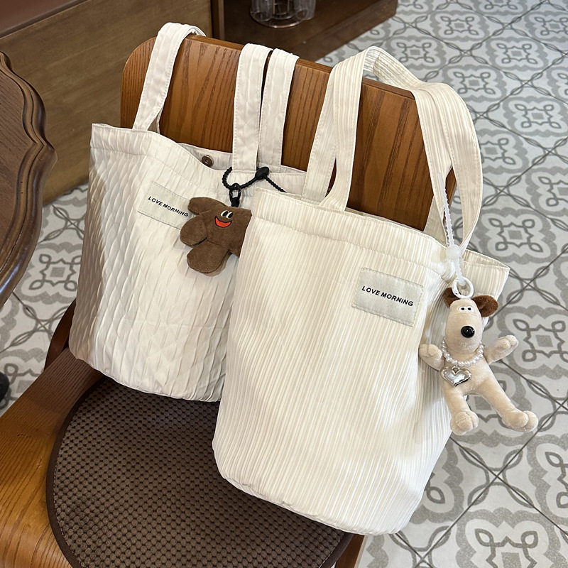 2024新款ins休闲百搭妈咪白色女水桶包大容量单肩通勤便当帆布袋,箱包皮具/热销女包/男包,时尚帆布包,淘宝优惠券,粉丝福利购,淘宝优惠卷