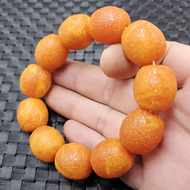 荧光浮盐水蜜蜡桶珠手链人造橘红色蜜蜡路路通手链磨砂手链手串