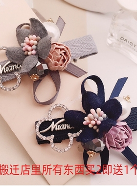 刘海夹珍珠蝴蝶结布艺弹簧发饰