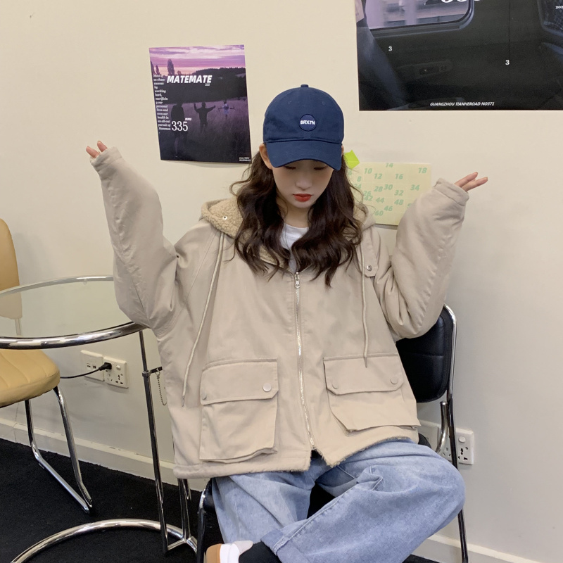 Real shot of new lamb wool coat in autumn and winter