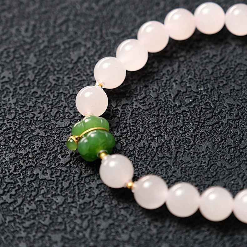 【粉黛】天然和田玉老坑藕粉猫眼碧玉果绿色18k金并蒂莲8mm女手串