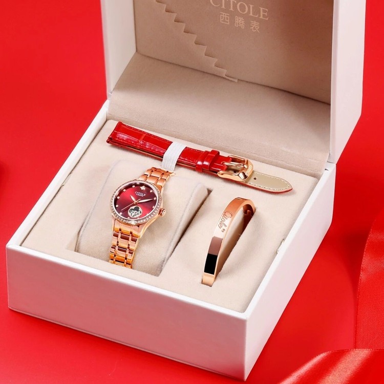 西腾镂空全自动酒红色四叶草腕表