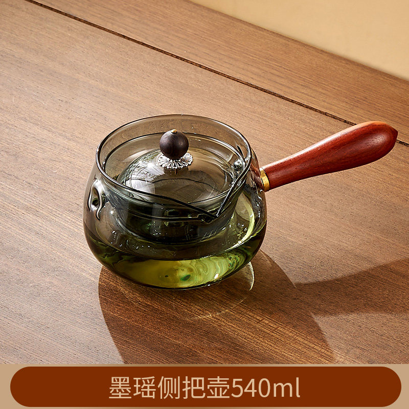 墨瑶侧把茶壶