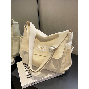 帆布包高级感小众包包女式2026新款超火上学大学生通勤单肩斜挎包