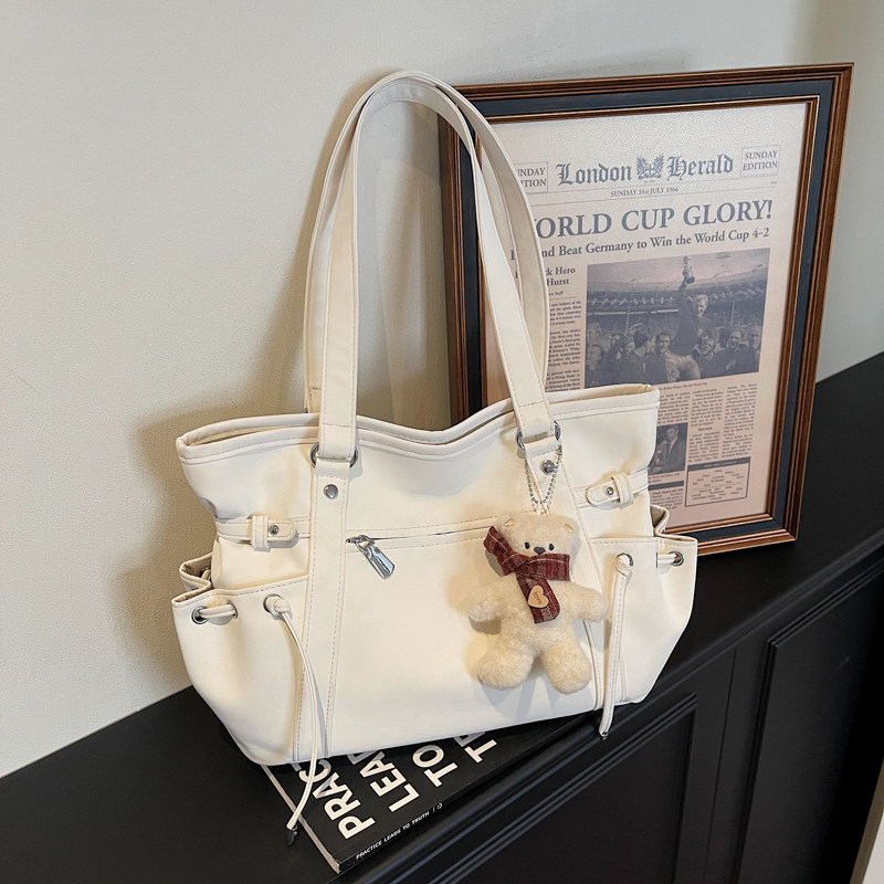 都市简约风托特包女2026新款百搭气质单肩包通勤大容量休闲腋下包