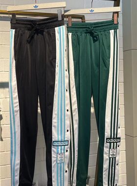 女子运动侧边按扣排扣裤