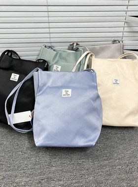 猫店款~官价177~缎面托特包感通勤手提袋松弛感轻量单肩包女尾货