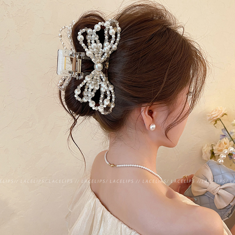 优雅珍珠蝴蝶结抓夹女2026新款鲨鱼夹子漂亮高级感独特盘发夹头饰