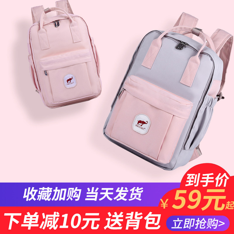 韩版甜甜圈双肩包女中小学生书包校园时尚百搭帆布旅行电脑背包男