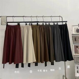 2024秋冬纯色口袋皮裙半身裙裙子女时尚 显瘦中长裙潮流欧货遮肉韩