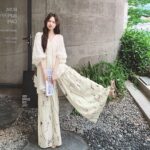 法式松弛感慵懒风两件套女2026春新款不规则V领上衣印花长裤套装