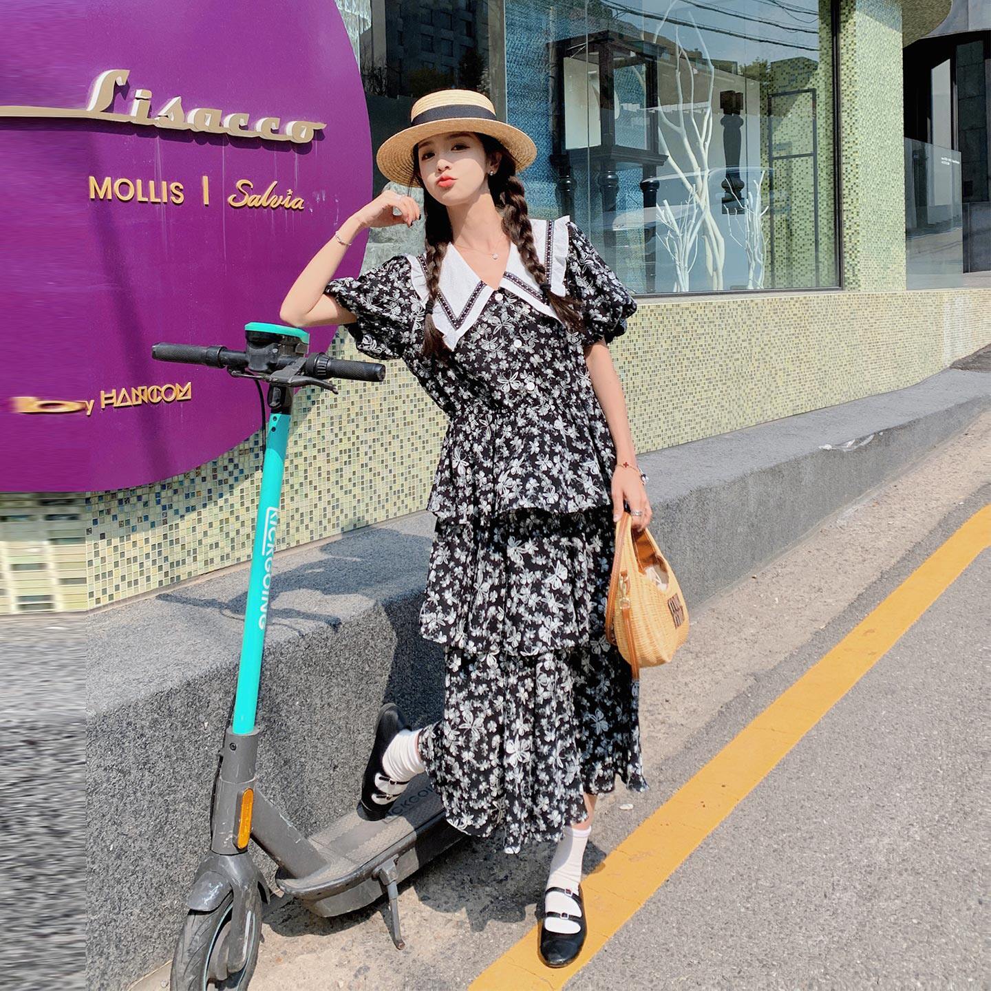 黑色法式复古田园风碎花连衣裙女2026夏新款撞色娃娃领显瘦A字裙