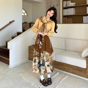 黄色法式油画风文艺套装女2026春季新款时尚披肩衬衫半身裙两件套