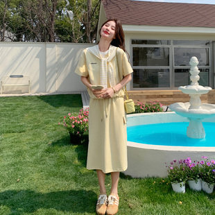 黄色休闲运动风百搭套装女2026春新款韩系两件短袖半身裙两件套