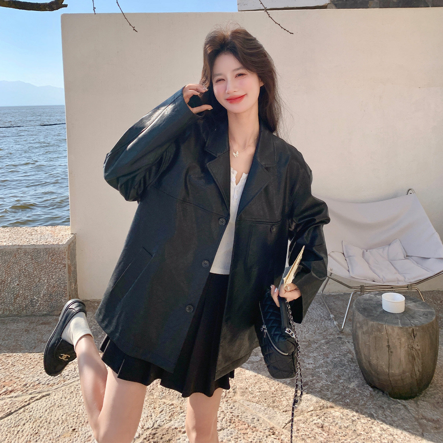 黑色翻领皮衣女宽松气质西装领