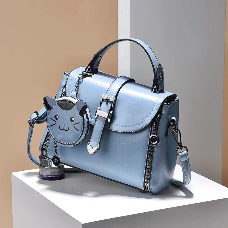 2023新款韩版简约可爱少女风小方包猫猫时尚零钱手提单肩包