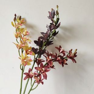 年宵花11头蕙兰仿真花保湿手感兰花婚庆酒店家居软装假花蕙兰软装