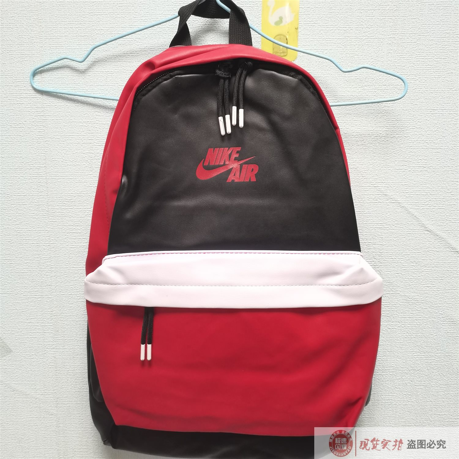 Nike 耐克正品男女书包皮面时尚学生运动休闲双肩背包CW7690-01