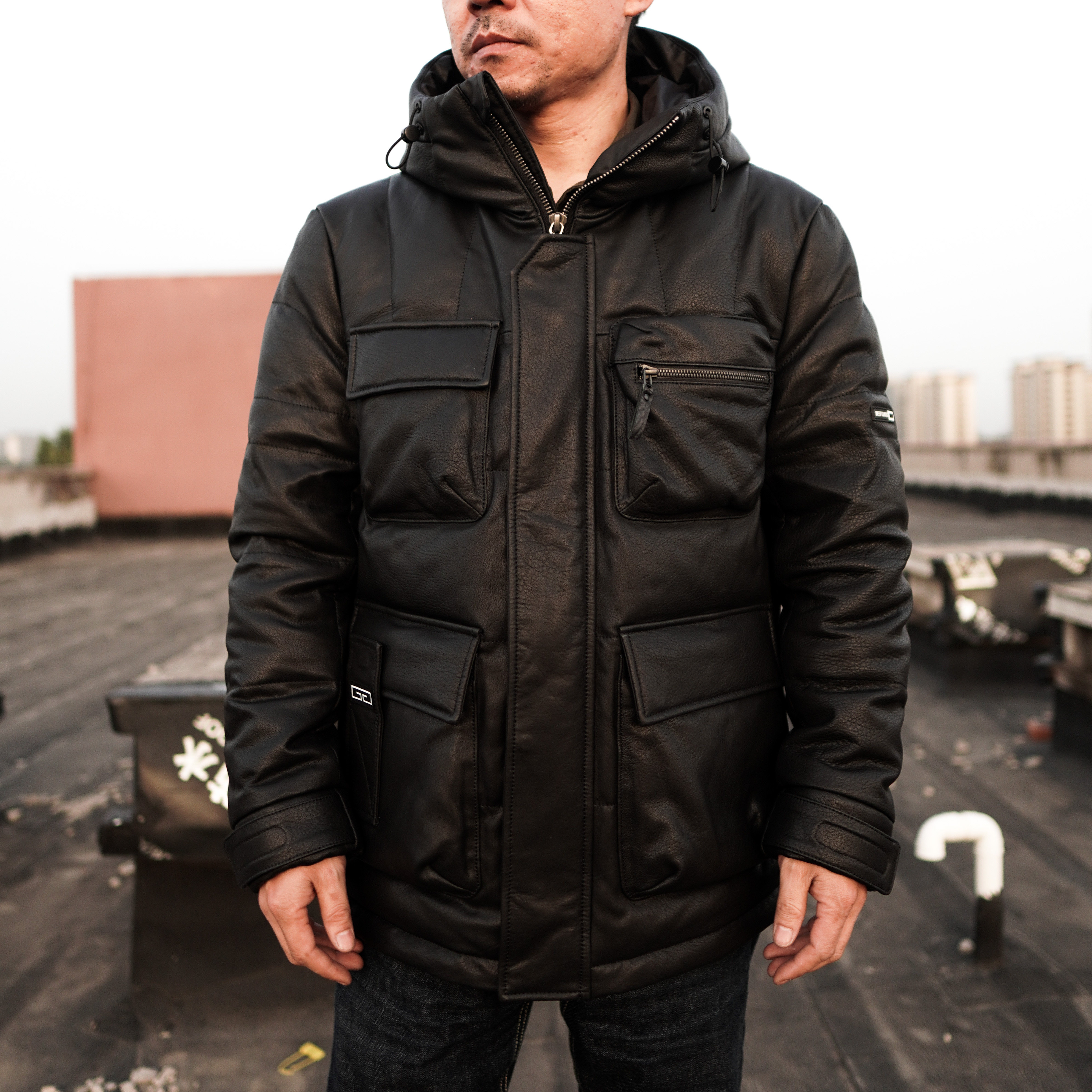 男士中长款真皮羽绒服休闲连帽绵羊保暖防寒黑色防风加绒多兜