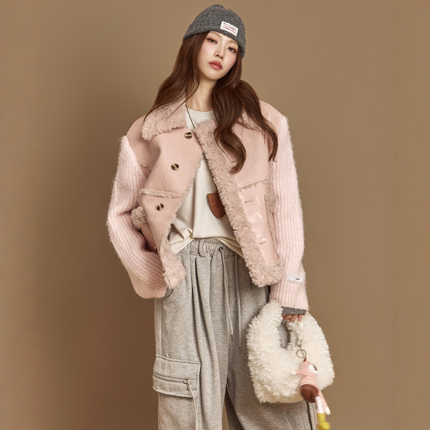 Haners家韩国代购女设计师款2025年冬新品时髦皮毛一体拼袖厚外套