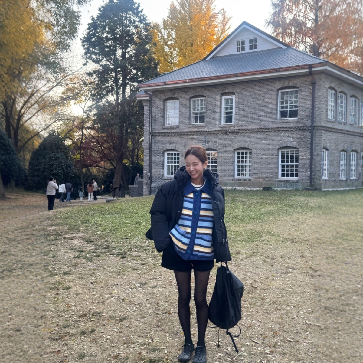 Haners家韩国代购文艺女青年2025年冬纯色保暖羽绒服