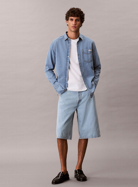 2026年夏季新款Calvin Klein韩版男青年蓝色纯棉过膝牛仔直筒短裤