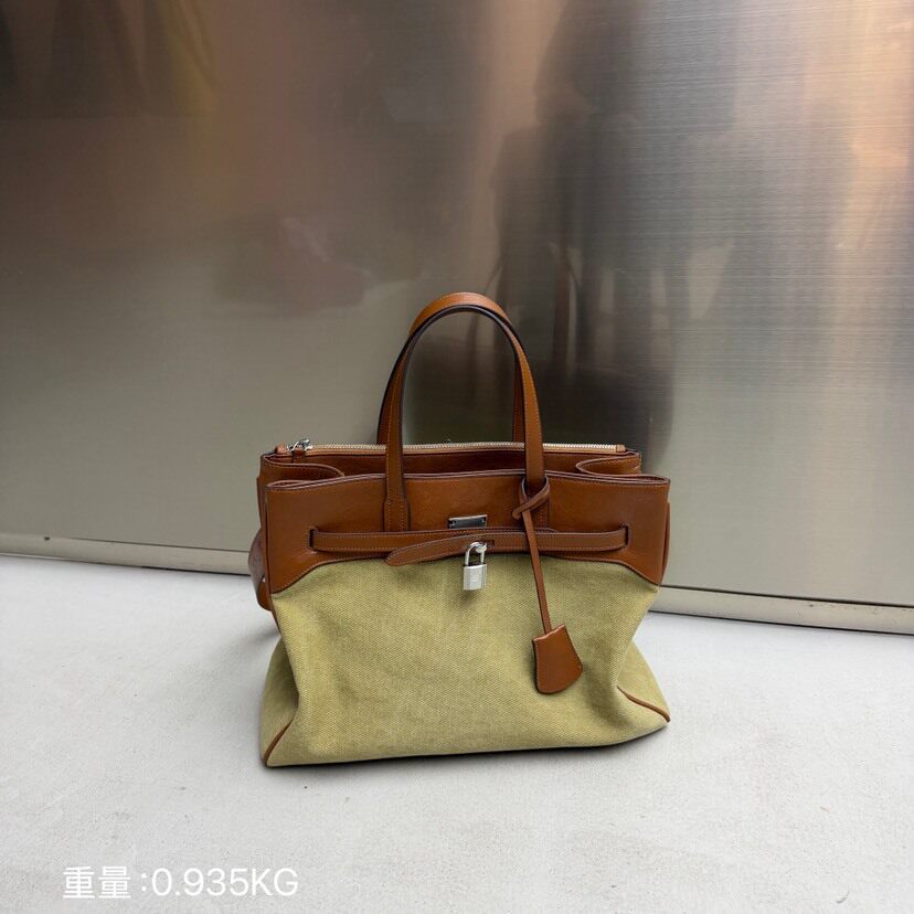 包包女2026新款网红撞色复古牛皮大容量托特包帆布锁扣单肩斜挎包