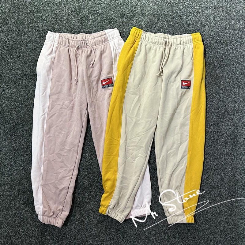 耐克女子收脚拼色宽松长裤