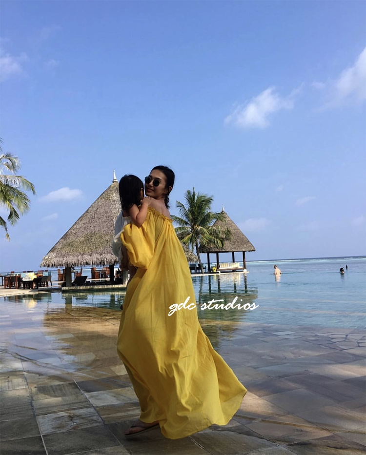 欧美度假海滩街拍一字肩夏仙气长款泡泡袖黄色飘逸露肩抹胸连衣裙