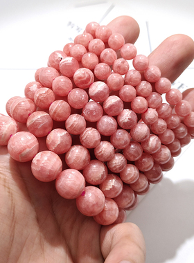 阿根廷天然红纹石粉水晶