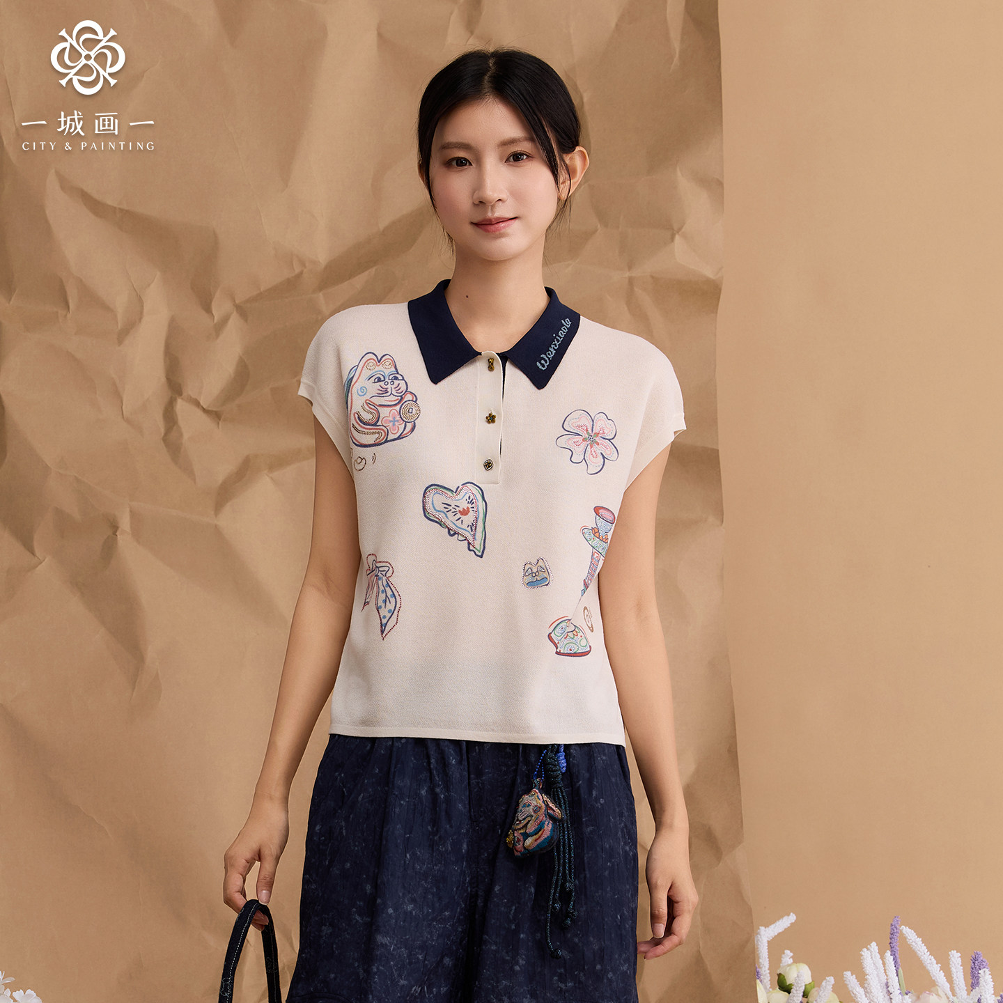 一城画一2026夏季新款休闲风小翻领设计短袖修身短款套头毛衫女