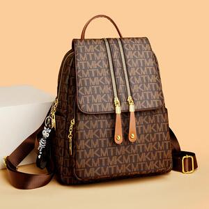 专柜正品真皮双肩包女2025新款防盗轻便大容量旅游背包时尚女包软