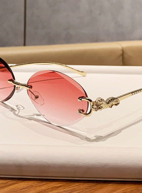 女潮小香儿金属无框椭圆墨镜