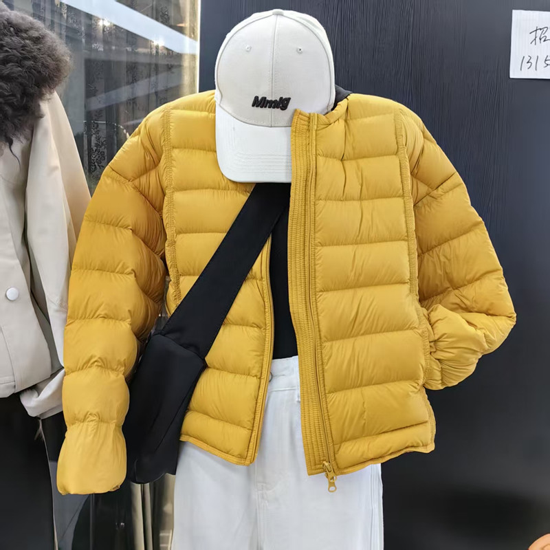 黄色羽绒服女圆领短款