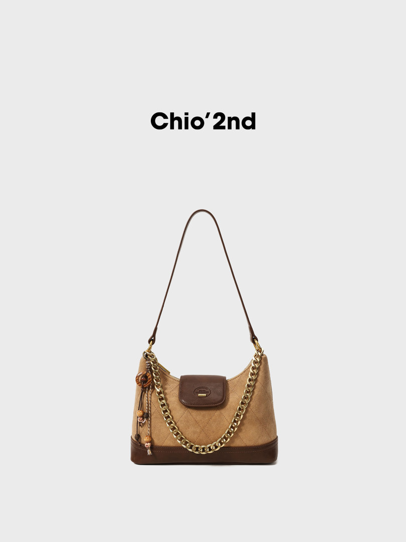Brown shoulder bag with chain strap on a white background