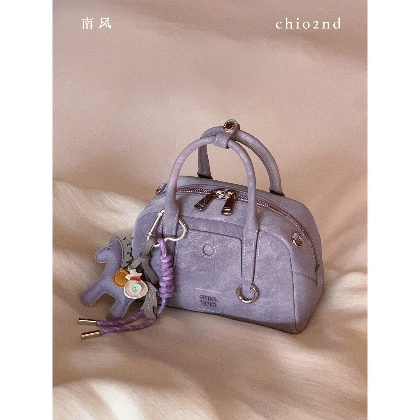 南风Chio2nd 生日礼物女生枕头包包2026新款超火紫色手提包斜挎包