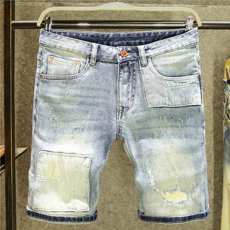 夏季薄款浅蓝色破洞牛仔短