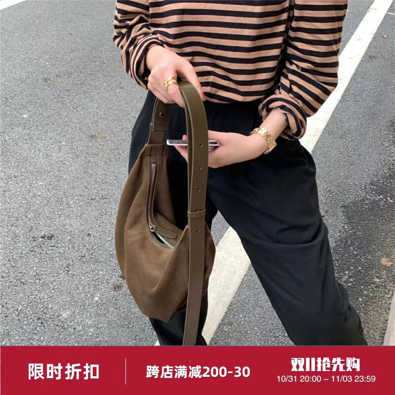 韩国小众nothingwritten麂皮包简约通勤饺子包女流浪包单肩腋下包属于什么档次？