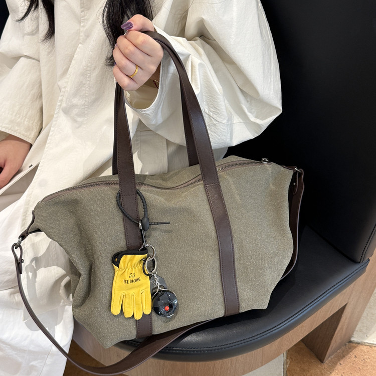 慵懒感头层牛皮拼水洗帆布包