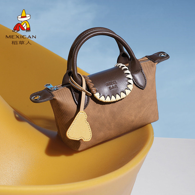 稻草人包包女款秋冬新款斜挎包小众时尚饺子包撞色单肩包通勤女包