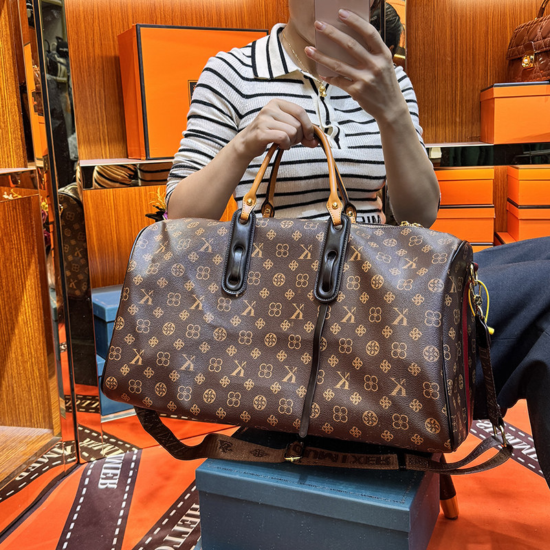 正品真皮女包短途旅行包